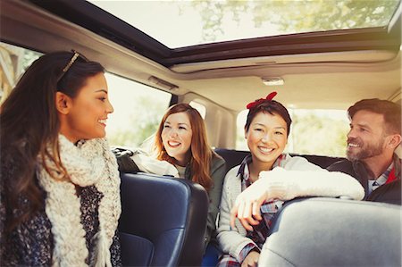simsearch:6113-08743597,k - Friends talking and riding in car Stock Photo - Premium Royalty-Free, Code: 6113-08743399