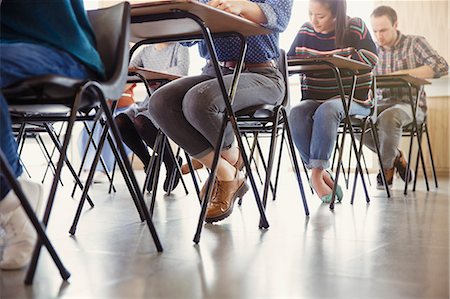 simsearch:649-06041393,k - College students taking test at desks in classroom Stock Photo - Premium Royalty-Free, Code: 6113-08769661