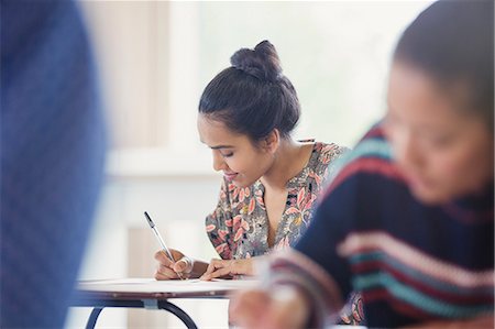 simsearch:649-06041393,k - Female college student taking test at desk in classroom Stock Photo - Premium Royalty-Free, Code: 6113-08769701