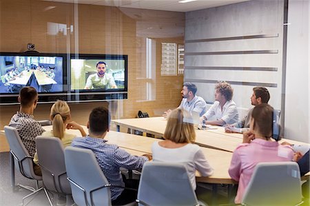 Business people in video conference meeting Stock Photo - Premium Royalty-Free, Code: 6113-08784454