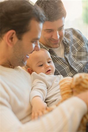 simsearch:649-07437107,k - Male gay parents holding baby son Stock Photo - Premium Royalty-Free, Code: 6113-08947272