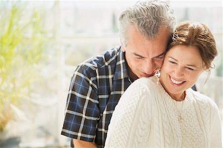 simsearch:6113-07589438,k - Affectionate mature couple smiling Stock Photo - Premium Royalty-Free, Code: 6113-08985752