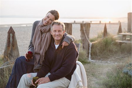 simsearch:6113-07790692,k - Portrait affectionate mature couple drinking wine on sunset beach Stock Photo - Premium Royalty-Free, Code: 6113-08985831