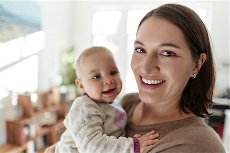 simsearch:6113-07543218,k - Portrait smiling mother and baby daughter Stock Photo - Premium Royalty-Free, Code: 6113-08910078