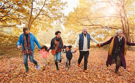 simsearch:649-06623087,k - Playful multi-generation family running in autumn park Stock Photo - Premium Royalty-Free, Code: 6113-08910152