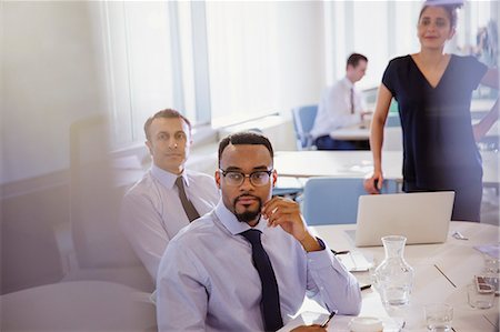 simsearch:6113-07906249,k - Attentive business people listening in conference room meeting Stock Photo - Premium Royalty-Free, Code: 6113-09004943