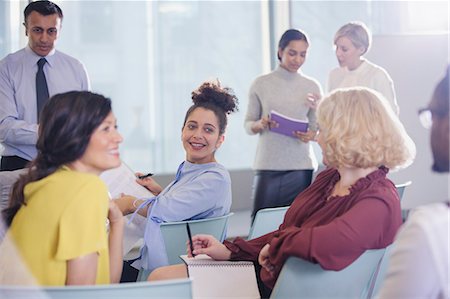 simsearch:6113-06899132,k - Business people talking in conference audience Stock Photo - Premium Royalty-Free, Code: 6113-09005018