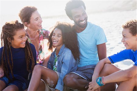 simsearch:632-05845211,k - Multi-ethnic family laughing on sunny summer beach Stock Photo - Premium Royalty-Free, Code: 6113-09027761