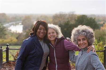 simsearch:6113-06899255,k - Portrait smiling, confident active senior women friends in autumn park Stock Photo - Premium Royalty-Free, Code: 6113-09157584