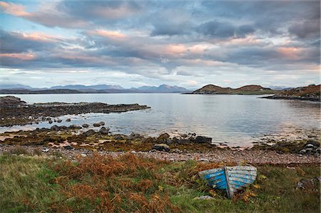 Abandoned boat at remote tranquil lake, Cove, Loch Ewe, Wester Ross, Scotland Stock Photo - Premium Royalty-Free, Code: 6113-09157770