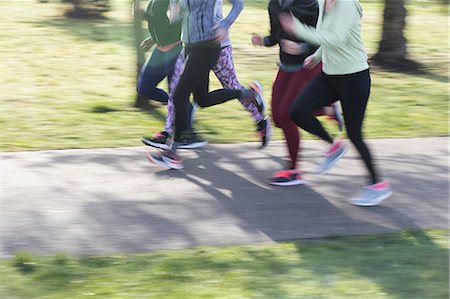 simsearch:628-05817723,k - Runners on the move, running in park Stock Photo - Premium Royalty-Free, Code: 6113-09168332