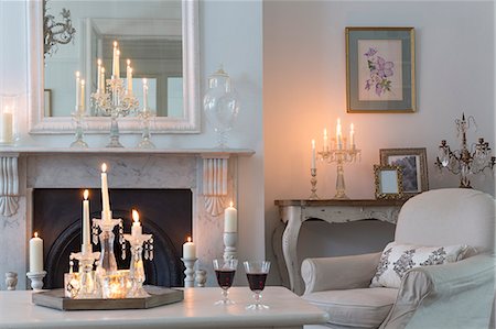 simsearch:6113-07589638,k - Candlelit luxury home showcase interior living room with fireplace Foto de stock - Sin royalties Premium, Código: 6113-09111894