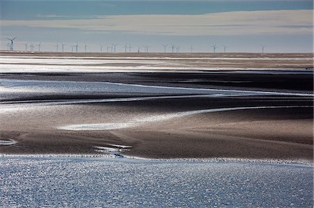 simsearch:6113-07589515,k - Wind turbines in distance beyond bay, Morecambe Bay, UK Stock Photo - Premium Royalty-Free, Code: 6113-09131447