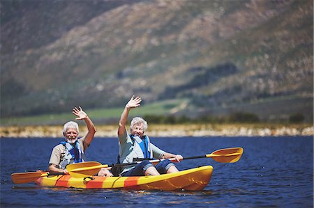 simsearch:6122-07699789,k - Portrait active senior couple in kayak waving on sunny summer lake Stock Photo - Premium Royalty-Free, Code: 6113-09131521