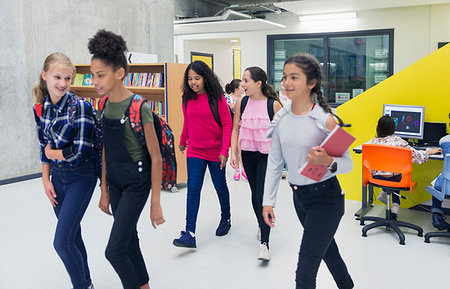 simsearch:649-07280058,k - Junior high girl students walking in library Stock Photo - Premium Royalty-Free, Code: 6113-09240304