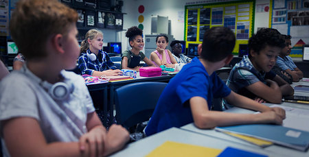 simsearch:649-07280058,k - Junior high school students at desks in classroom Stock Photo - Premium Royalty-Free, Code: 6113-09240453