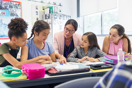 simsearch:649-06041393,k - Female teacher and junior high school girl students studying at desk in classroom Stock Photo - Premium Royalty-Free, Code: 6113-09240429