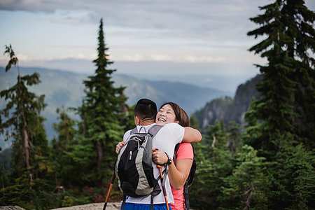 simsearch:6113-07543549,k - Happy couple hiking, hugging on mountain, Dog Mountain, BC, Canada Stock Photo - Premium Royalty-Free, Code: 6113-09240822