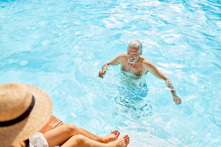 simsearch:6113-07242393,k - Mature man in sunny summer swimming pool Stock Photo - Premium Royalty-Free, Code: 6113-09241169
