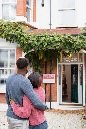 simsearch:649-03447245,k - Happy couple hugging outside new house Stock Photo - Premium Royalty-Free, Code: 6113-09241311