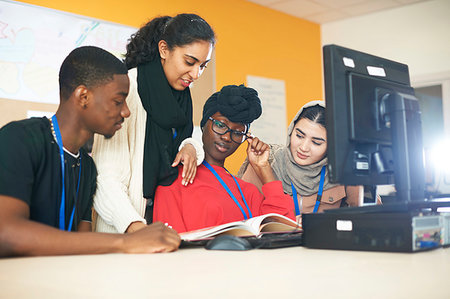 simsearch:649-07118442,k - Multi-ethnic college students studying at computer in computer lab Stock Photo - Premium Royalty-Free, Code: 6113-09272648