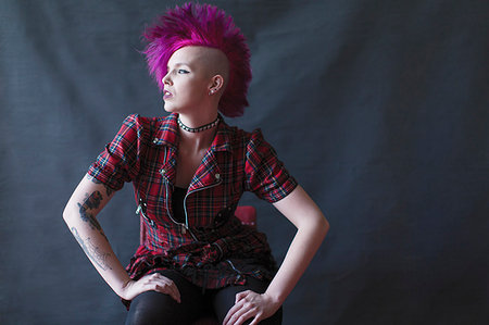 simsearch:614-08392638,k - Portrait confident, cool young woman with pink mohawk Stock Photo - Premium Royalty-Free, Code: 6113-09200002