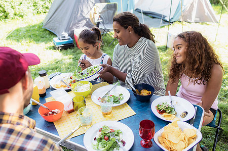 simsearch:614-07806265,k - Family enjoying lunch at campsite table Stock Photo - Premium Royalty-Free, Code: 6113-09239951
