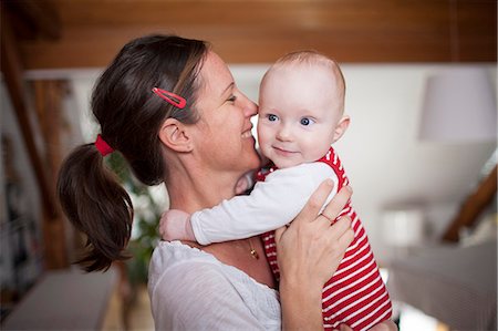 simsearch:6115-07539732,k - Young mother with baby girl, Munich, Bavaria, Germany Stock Photo - Premium Royalty-Free, Code: 6115-06779100