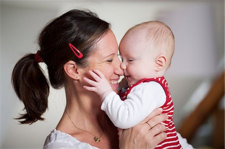 simsearch:6115-07539732,k - Young mother with baby girl, Munich, Bavaria, Germany Stock Photo - Premium Royalty-Free, Code: 6115-06779104