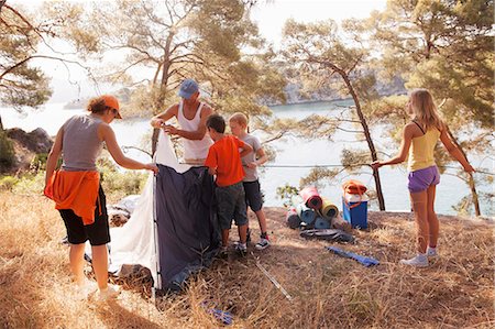 family series - Croatia, Dalmatia, Family holidays on camp site, pitching the tent Stock Photo - Premium Royalty-Free, Code: 6115-06732815