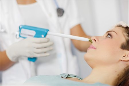 female doctor in gloves - Woman in Treatment Stock Photo - Premium Royalty-Free, Code: 6115-06733244