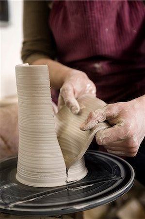 Craftswoman working on pottery wheel, Bavaria, Germany, Europe Foto de stock - Sin royalties Premium, Código: 6115-06967131