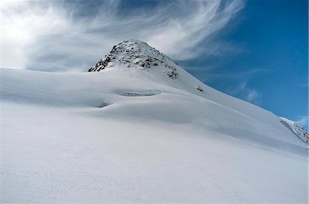 Snowcapped mountain top, European Alps, Tyrol, Austria Stock Photo - Premium Royalty-Free, Code: 6115-07109735