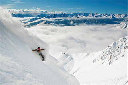 sports and snowboarding - Snowboarder takes a powder turn, Innsbruck, Austria Foto de stock - Sin royalties Premium, Código: 6115-07109803