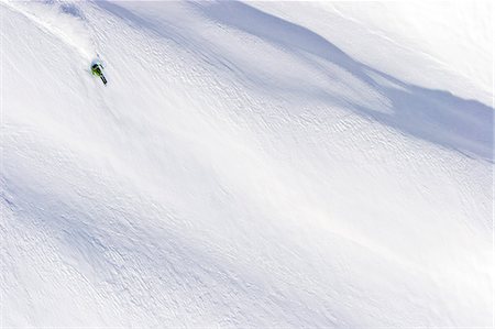 sports and snowboarding - Snowboarder speeding downhill, Innsbruck, Tyrol, Austria Stock Photo - Premium Royalty-Free, Code: 6115-07109800