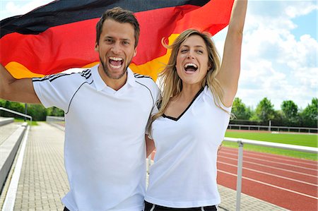 sport fan - Soccer fans waving German flag, Munich, Bavaria, Germany Stock Photo - Premium Royalty-Free, Code: 6115-07109917