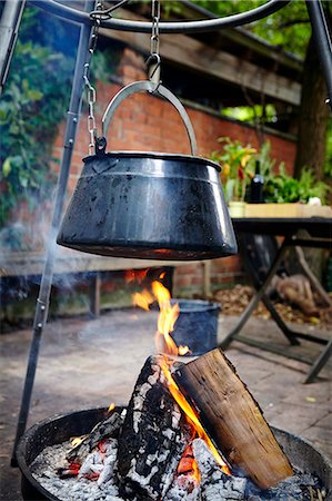 simsearch:6115-07282765,k - Cooking Pot Hanging On Hook Over Bonfire Stock Photo - Premium Royalty-Free, Code: 6115-07282741