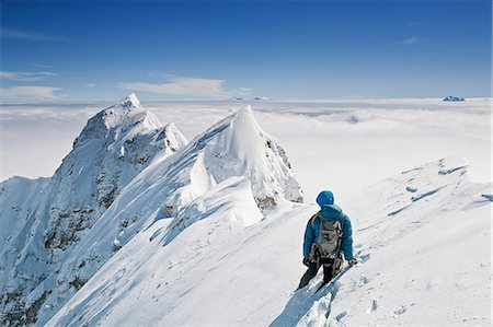 peak - Alpinist standing on mountain ridge, Zugspitze, Germany Stock Photo - Premium Royalty-Free, Code: 6115-07539740