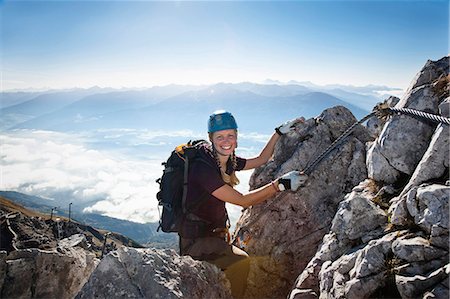 risk mountain - Female alpinist rock climbing, Innsbruck route, Tyrol, Austria Stock Photo - Premium Royalty-Free, Code: 6115-07539815