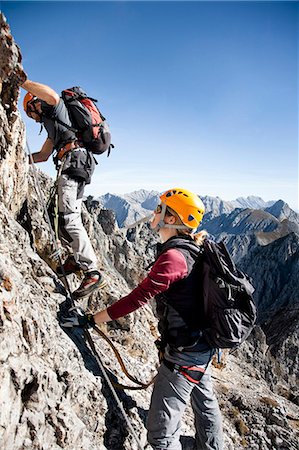 Two alpinists rock climbing, Innsbruck route, Tyrol, Austria Stock Photo - Premium Royalty-Free, Code: 6115-07539819