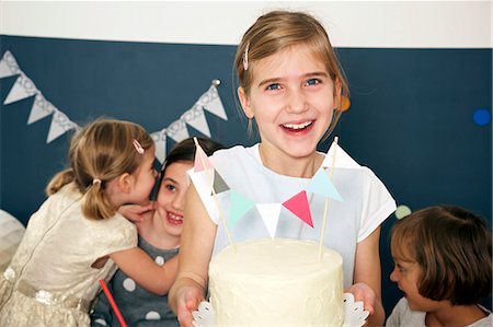 simsearch:6115-06778498,k - Children on birthday party serving cake, Munich, Bavaria, Germany Stock Photo - Premium Royalty-Free, Code: 6115-08066233