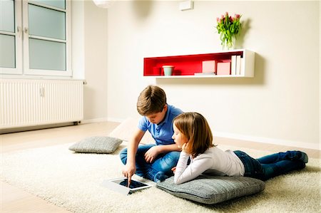 simsearch:649-07064267,k - Children using tablet computer at home, Munich, Bavaria, Germany Stock Photo - Premium Royalty-Free, Code: 6115-08066340