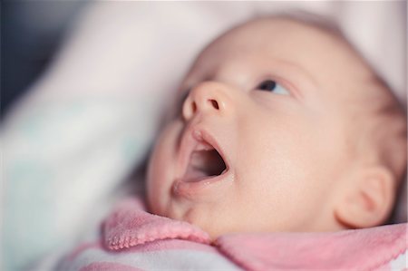 simsearch:6115-06778553,k - Portrait of baby girl with mouth open Stock Photo - Premium Royalty-Free, Code: 6115-08066422
