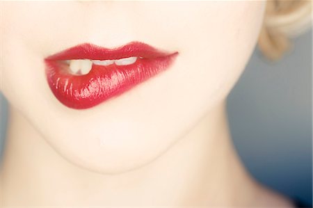 embarrassed women - Woman, Close-up of human lips, making a face Stock Photo - Premium Royalty-Free, Code: 6115-08066594