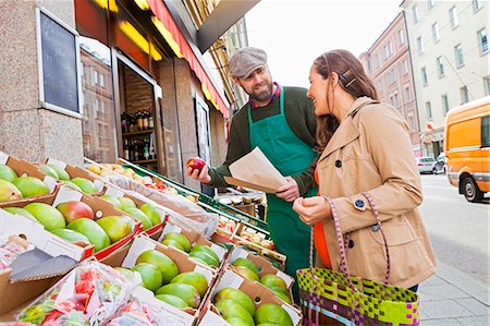 shopping bags city street - Greengrocer's shop, customer and grocer Stock Photo - Premium Royalty-Free, Code: 6115-08149276