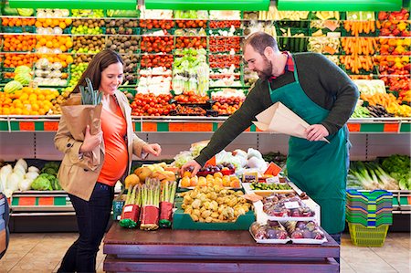 simsearch:6115-07282767,k - Female customer shopping in greengrocer's shop Stock Photo - Premium Royalty-Free, Code: 6115-08149298
