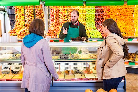 simsearch:6115-07282765,k - Female customers shopping in greengrocer's shop Stock Photo - Premium Royalty-Free, Code: 6115-08149299