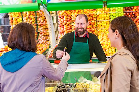 simsearch:6115-07282765,k - Female customers shopping in greengrocer's shop Stock Photo - Premium Royalty-Free, Code: 6115-08149300