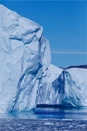 polar climate - Iceberg and ice floes, Arctic Ocean, Greenland Stock Photo - Premium Royalty-Free, Code: 6115-08101269