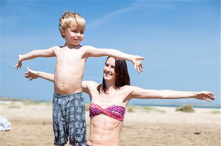 Mother and son playing on beach Stock Photo - Premium Royalty-Free, Code: 6115-08239267